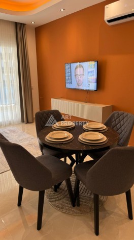 Стильная квартира 1+1 для отдыха и аренды, 500 м от моря в центре Махмутлара - Ракурс 15