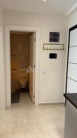 Стильная квартира 1+1 для отдыха и аренды, 500 м от моря в центре Махмутлара - Ракурс 17