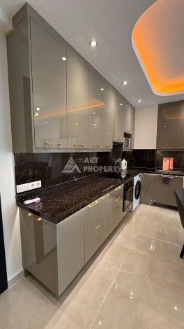 Стильная квартира 1+1 для отдыха и аренды, 500 м от моря в центре Махмутлара - Ракурс 19