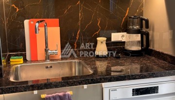 Стильная квартира 1+1 для отдыха и аренды, 500 м от моря в центре Махмутлара - Ракурс 43