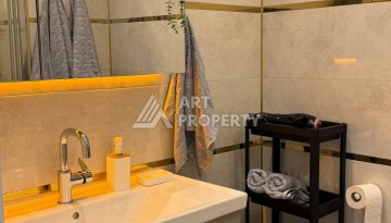 Стильная квартира 1+1 для отдыха и аренды, 500 м от моря в центре Махмутлара - Ракурс 45
