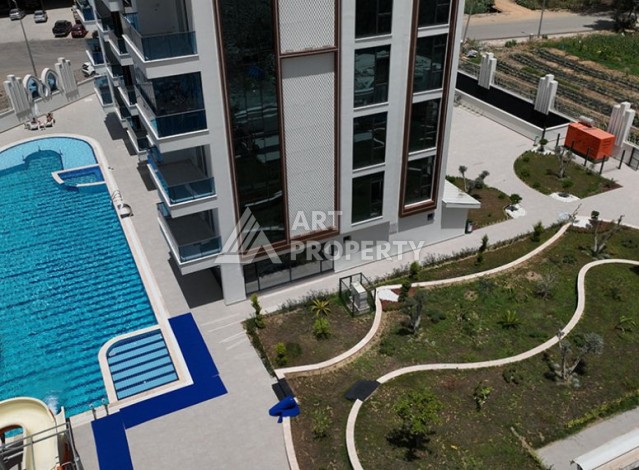 Стильная квартира 1+1 для отдыха и аренды, 500 м от моря в центре Махмутлара - Ракурс 46