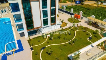 Стильная квартира 1+1 для отдыха и аренды, 500 м от моря в центре Махмутлара - Ракурс 51