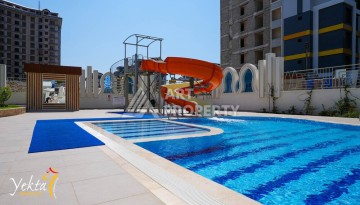 Стильная квартира 1+1 для отдыха и аренды, 500 м от моря в центре Махмутлара - Ракурс 68