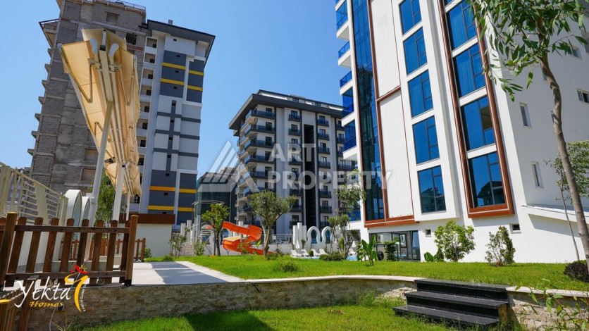 Стильная квартира 1+1 для отдыха и аренды, 500 м от моря в центре Махмутлара - Ракурс 68