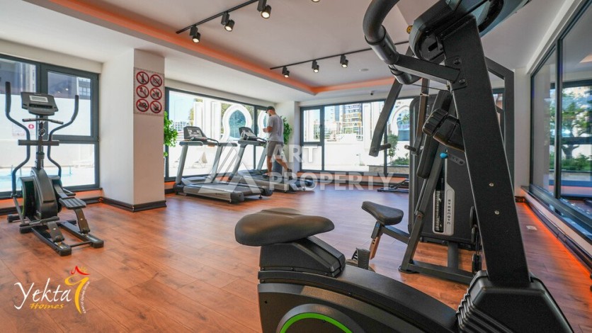 Стильная квартира 1+1 для отдыха и аренды, 500 м от моря в центре Махмутлара - Ракурс 78