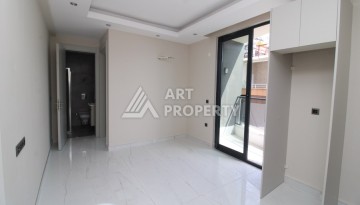 Двухкомнатная квартира 45 кв.м. в самом центре Махмутлара, всего 200 м от моря - Ракурс 8