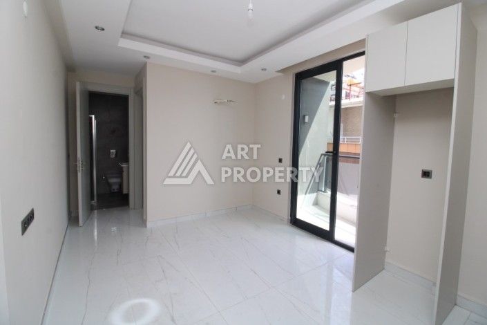 Двухкомнатная квартира 45 кв.м. в самом центре Махмутлара, всего 200 м от моря - Ракурс 7