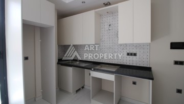 Двухкомнатная квартира 45 кв.м. в самом центре Махмутлара, всего 200 м от моря - Ракурс 9