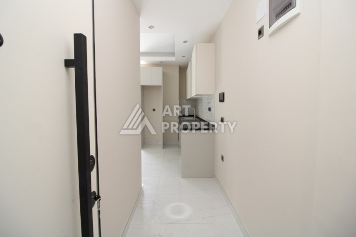 Двухкомнатная квартира 45 кв.м. в самом центре Махмутлара, всего 200 м от моря - Ракурс 9