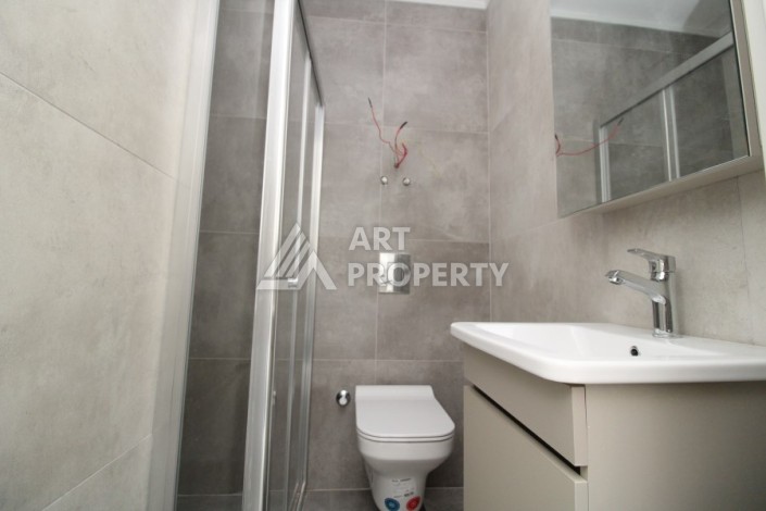 Двухкомнатная квартира 45 кв.м. в самом центре Махмутлара, всего 200 м от моря - Ракурс 12