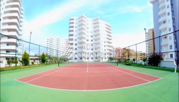 Квартира 2+1 в престижном ЖК всего 650 м от моря в Махмутларе - Ракурс 10