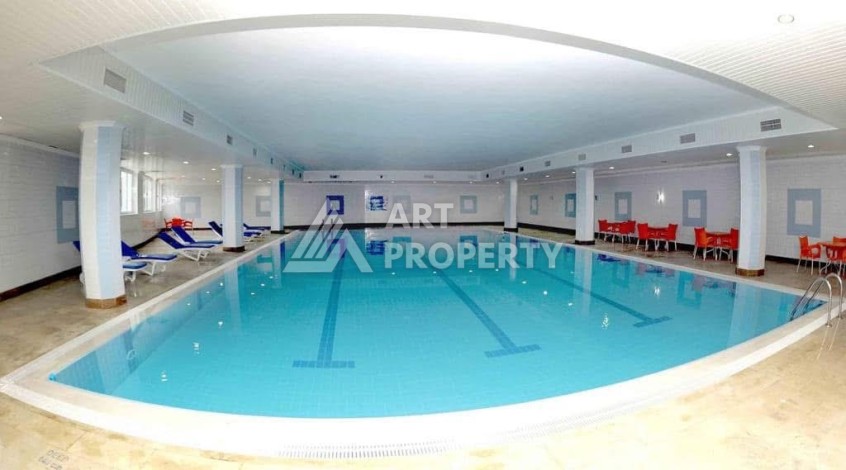 Квартира 2+1 в престижном ЖК всего 650 м от моря в Махмутларе - Ракурс 11