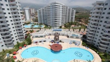 Квартира 2+1 в престижном ЖК всего 650 м от моря в Махмутларе - Ракурс 2