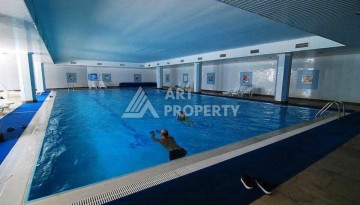 Квартира 2+1 в престижном ЖК всего 650 м от моря в Махмутларе - Ракурс 13
