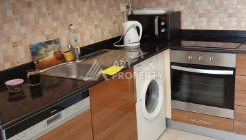 Квартира 2+1 в престижном ЖК всего 650 м от моря в Махмутларе - Ракурс 17