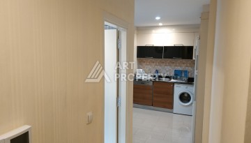 Квартира 2+1 в престижном ЖК всего 650 м от моря в Махмутларе - Ракурс 26