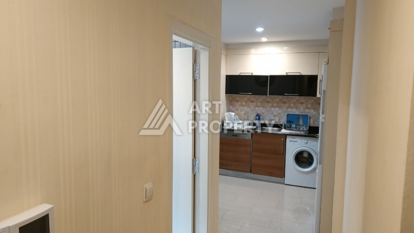 Квартира 2+1 в престижном ЖК всего 650 м от моря в Махмутларе - Ракурс 25