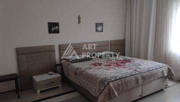 Квартира 2+1 в престижном ЖК всего 650 м от моря в Махмутларе - Ракурс 36
