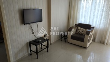 Квартира 2+1 в престижном ЖК всего 650 м от моря в Махмутларе - Ракурс 39