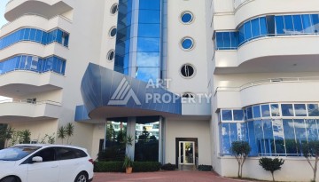 Квартира 2+1 в престижном ЖК всего 650 м от моря в Махмутларе - Ракурс 57
