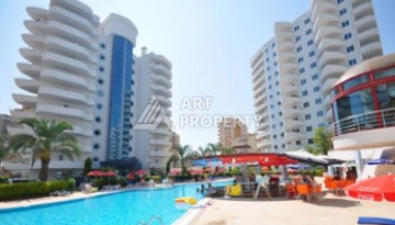 Квартира 2+1 в престижном ЖК всего 650 м от моря в Махмутларе - Ракурс 1