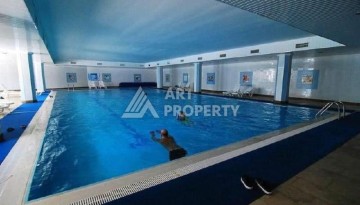 Квартира 2+1 в престижном ЖК всего 650 м от моря в Махмутларе - Ракурс 79