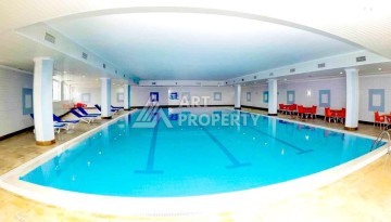 Квартира 2+1 в престижном ЖК всего 650 м от моря в Махмутларе - Ракурс 85