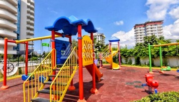 Квартира 2+1 в престижном ЖК всего 650 м от моря в Махмутларе - Ракурс 97
