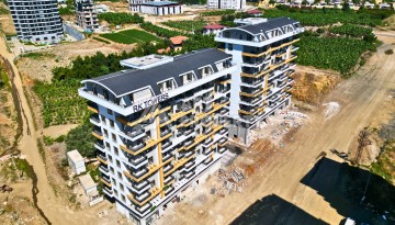 Живи сейчас, плати потом. Квартира 1+1 в центре Махмутлара, 46 кв.м. - Ракурс 3
