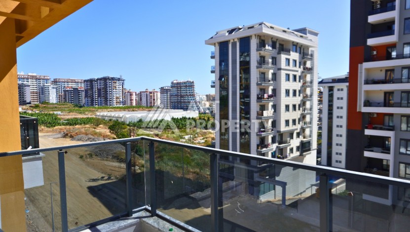 Живи сейчас, плати потом. Квартира 1+1 в центре Махмутлара, 46 кв.м. - Ракурс 8