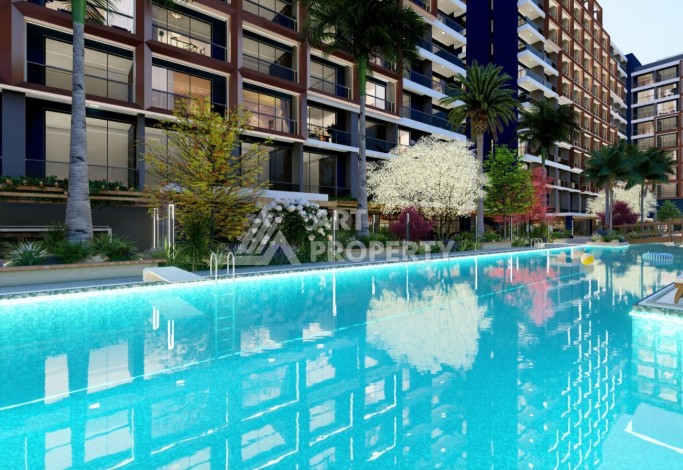 Старт строительства инвестиционного проекта с квартирами 0+1, 1+1, 2+1 в 520 метрах от моря. Томюк, Мерсин. - Ракурс 24