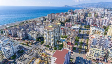 Квартира 2+1, 102 м² в престижной резиденции Махмутлара, всего 120 метров до моря. - Ракурс 1