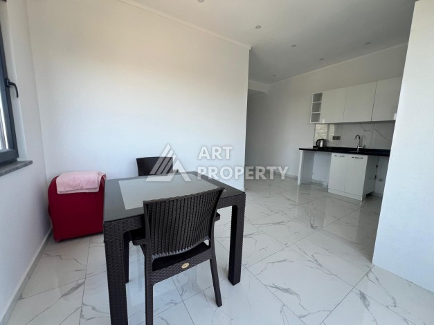 Двухкомнатная квартира с видом на море 50 кв.м. в центре Махмутлара - Ракурс 21