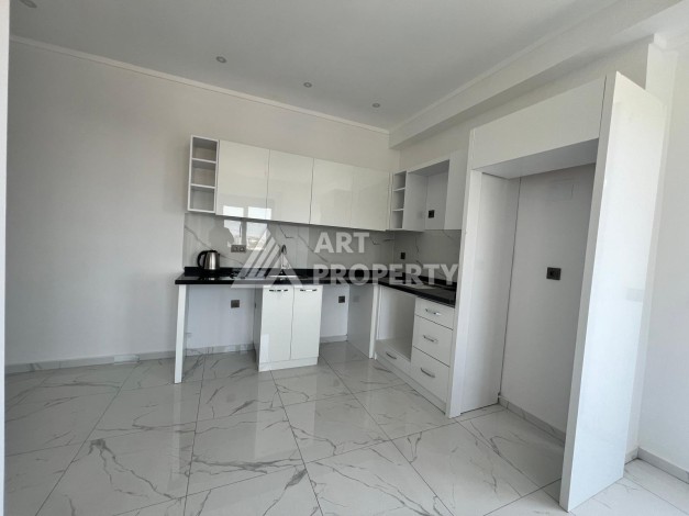 Двухкомнатная квартира с видом на море 50 кв.м. в центре Махмутлара - Ракурс 22