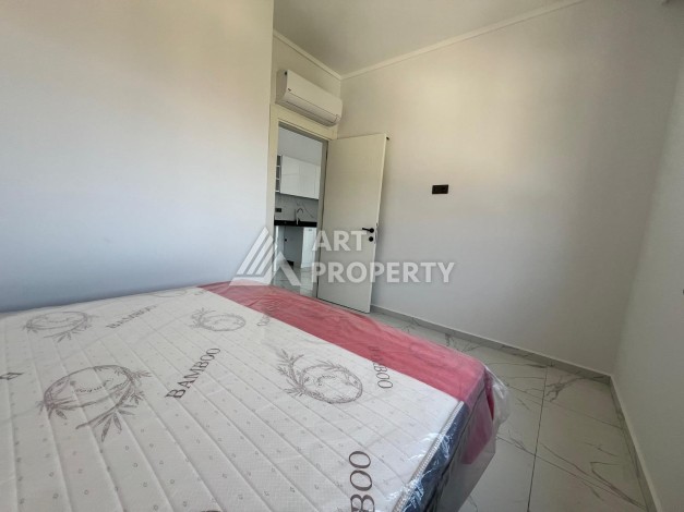 Двухкомнатная квартира с видом на море 50 кв.м. в центре Махмутлара - Ракурс 28