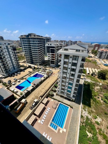 Квартира 1+1 в центре Махмутлара, 600 м до моря - Ракурс 2