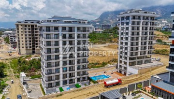 Квартира 1+1 в центре Махмутлара, 600 м до моря - Ракурс 2