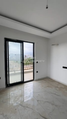 Квартира 1+1 в центре Махмутлара, 600 м до моря - Ракурс 13