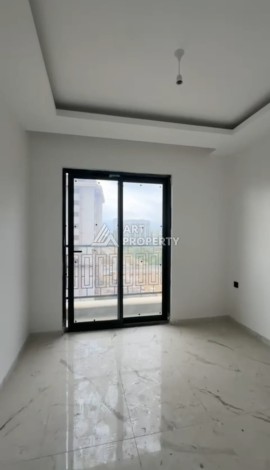 Квартира 1+1 в центре Махмутлара, 600 м до моря - Ракурс 18