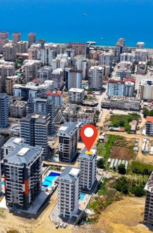 Квартира 1+1 в центре Махмутлара, 600 м до моря - Ракурс 3