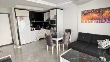 Меблированная квартира 1+1 в Махмутларе, 60 кв.м. - Ракурс 2