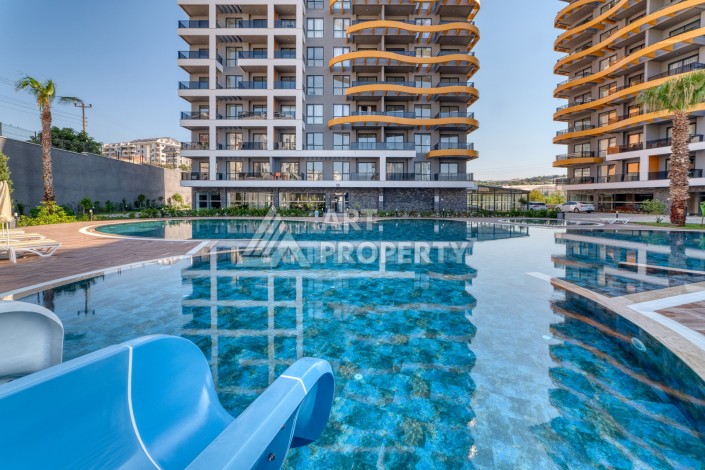 Квартира 1+1 с видом на бассейн в Авсалларе, 57,5 м² - Ракурс 1