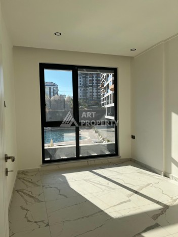 Квартира 1+1 с видом на бассейн в Авсалларе, 57,5 м² - Ракурс 45