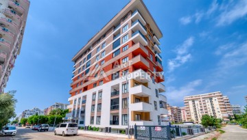 Квартира 1+1 с мебелью, 350 м от моря в центре Махмутлара - Ракурс 1