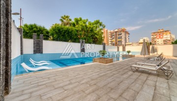 Квартира 1+1 с мебелью, 350 м от моря в центре Махмутлара - Ракурс 2