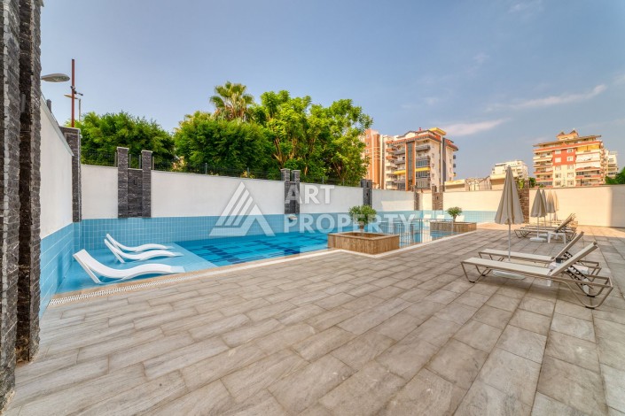 Квартира 1+1 с мебелью, 350 м от моря в центре Махмутлара - Ракурс 1