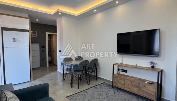 Квартира 1+1 с мебелью, 350 м от моря в центре Махмутлара - Ракурс 14