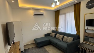 Квартира 1+1 с мебелью, 350 м от моря в центре Махмутлара - Ракурс 16