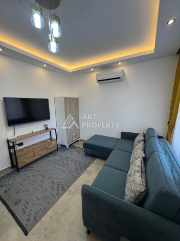 Квартира 1+1 с мебелью, 350 м от моря в центре Махмутлара - Ракурс 16